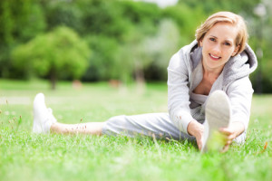 Woman stretching outdoors