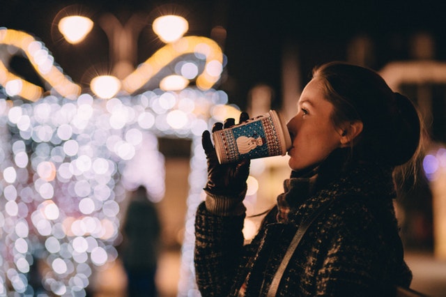 woman-drinking-coffee-christmas-peaceful